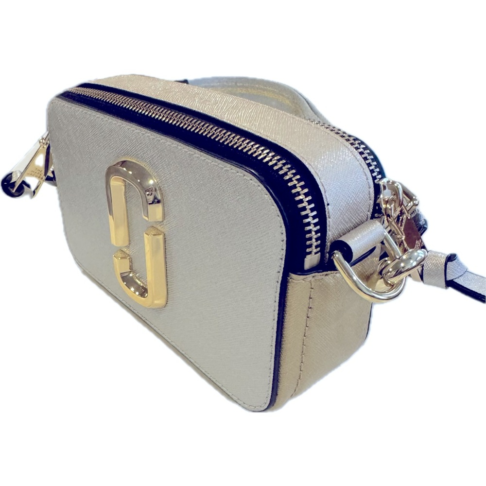 The Marc Jacobs Snapshot bag in limited edition gold and silver! So cute!